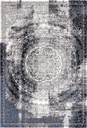 Tapis en laine AGNUS-B CURRUS noir, motif patiné d'inspiration orientale à médaillon central
